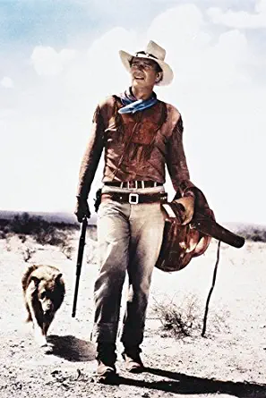 Hondo John Wayne iconic 24X36 Poster carrying rifle & saddle walking with dog